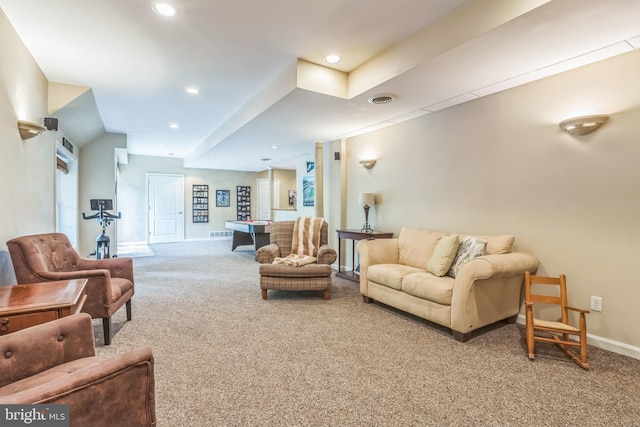 carpeted living room featuring visible vents, recessed lighting, and baseboards