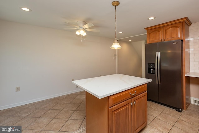 kitchen with light tile patterned floors, stainless steel fridge with ice dispenser, ceiling fan, and recessed lighting