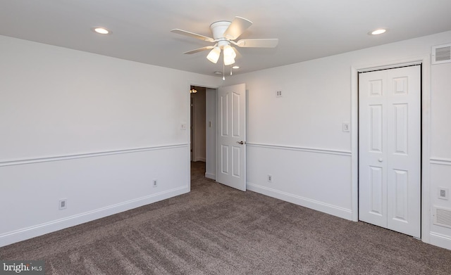 carpeted spare room featuring baseboards, a ceiling fan, and recessed lighting