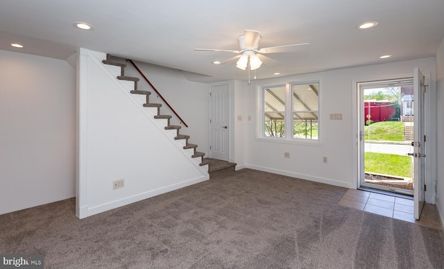 carpeted entrance foyer featuring stairs, recessed lighting, ceiling fan, and baseboards