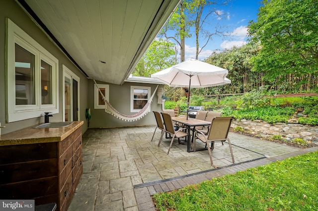 219 Gateswood Rd, Lutherville Timonium, MD 21093 - view of patio featuring a sink and outdoor dining area