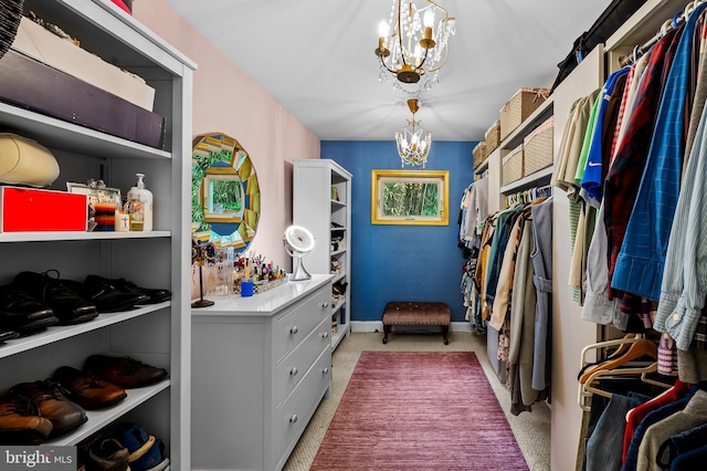 219 Gateswood Rd, Lutherville Timonium, MD 21093 - walk in closet with light carpet and an inviting chandelier