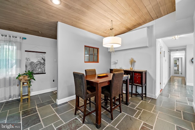 219 Gateswood Rd, Lutherville Timonium, MD 21093 - dining area with baseboards, recessed lighting, wooden ceiling, and stone tile flooring