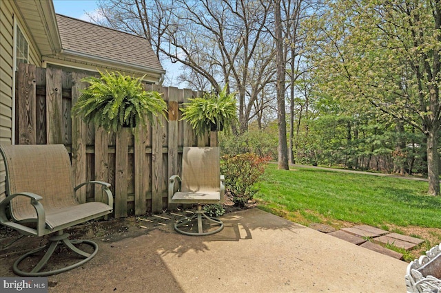 view of patio with fence