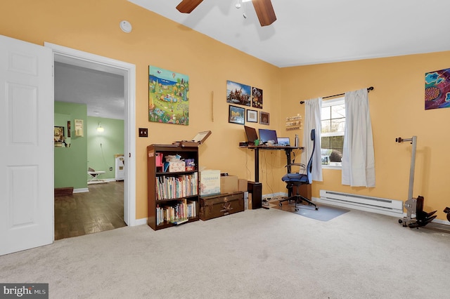 1112 Conservation Dr, Hedgesville, WV 25427 - exercise area with baseboard heating, carpet flooring, ceiling fan, and baseboards