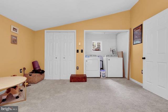1112 Conservation Dr, Hedgesville, WV 25427 - recreation room with washer and clothes dryer, vaulted ceiling, and carpet