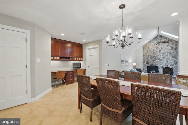1253 Rowland Dr, Herndon, VA 20170 - dining space featuring a fireplace, vaulted ceiling, baseboards, a chandelier, and light tile patterned flooring