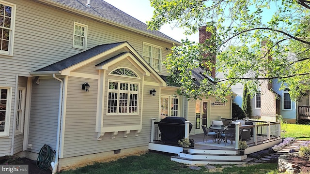 1253 Rowland Dr, Herndon, VA 20170 - rear view of property featuring a wooden deck, crawl space, outdoor dining area, and roof with shingles