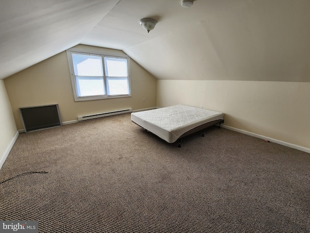 bedroom featuring baseboards, vaulted ceiling, carpet flooring, and a baseboard radiator