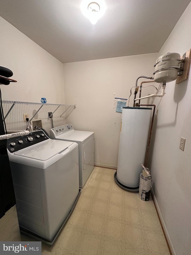1 Warthens Way Unit H, Emmitsburg, MD 21727 - washroom featuring independent washer and dryer, water heater, light floors, and baseboards