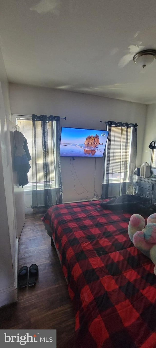 bedroom featuring wood finished floors
