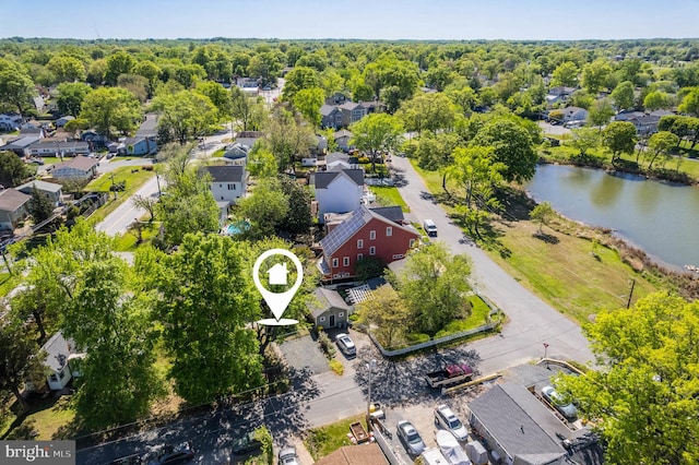 bird's eye view with a water view and a residential view