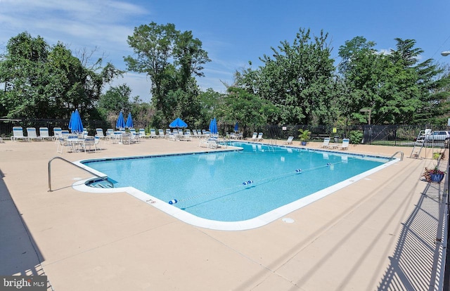4600 Duke St Unit 1018, Alexandria, VA 22304 - pool with a patio and fence