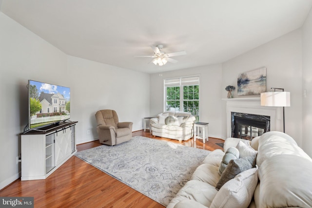 6 Crawford Ln, Stafford, VA 22556 - living area featuring a high end fireplace, baseboards, ceiling fan, and wood finished floors