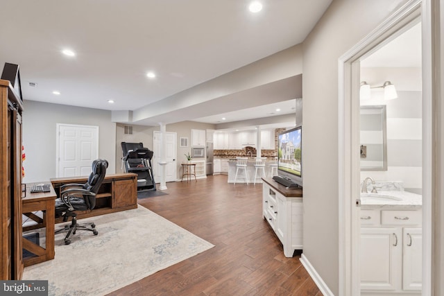 6 Crawford Ln, Stafford, VA 22556 - office area with recessed lighting, dark wood finished floors, and a sink