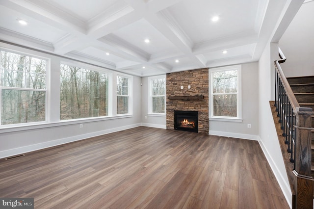 unfurnished living room featuring visible vents, beamed ceiling, stairway, coffered ceiling, and dark wood finished floors