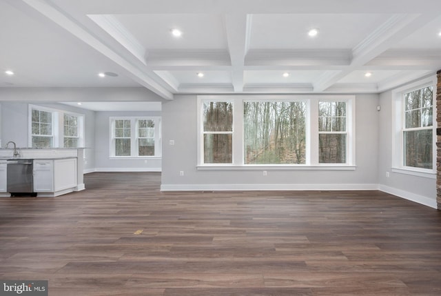 unfurnished living room with baseboards, recessed lighting, and beam ceiling