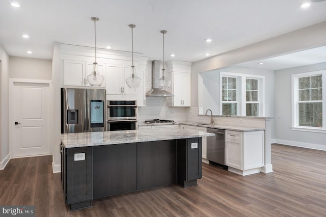 kitchen featuring baseboards, wall chimney exhaust hood, tasteful backsplash, dark wood finished floors, and stainless steel appliances