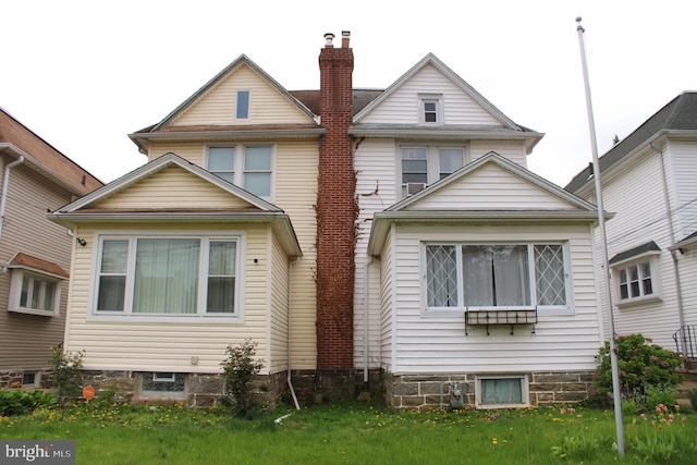 1016 Whitby Ave, Lansdowne, PA 19050 - rear view of house featuring a chimney and a lawn