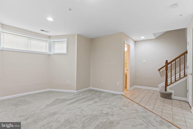 10232 Rutland Round Rd Unit 24, Columbia, MD 21044 - below grade area with recessed lighting, stairway, visible vents, light carpet, and baseboards