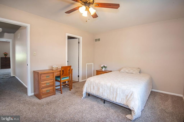 bedroom featuring light colored carpet, visible vents, ceiling fan, and baseboards