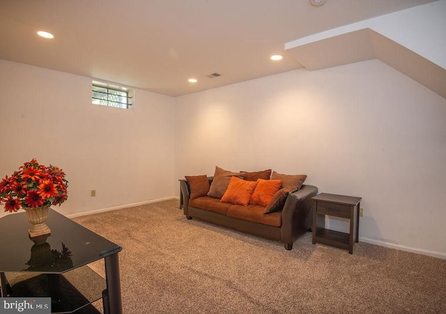carpeted living room featuring visible vents, recessed lighting, and baseboards