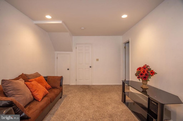 living area featuring recessed lighting and carpet floors