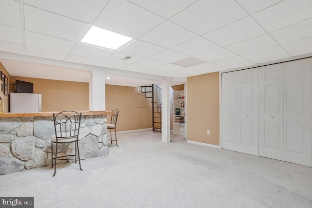 611 Cypress Rd, Severna Park, MD 21146 - interior space with a paneled ceiling, visible vents, baseboards, stairway, and a dry bar