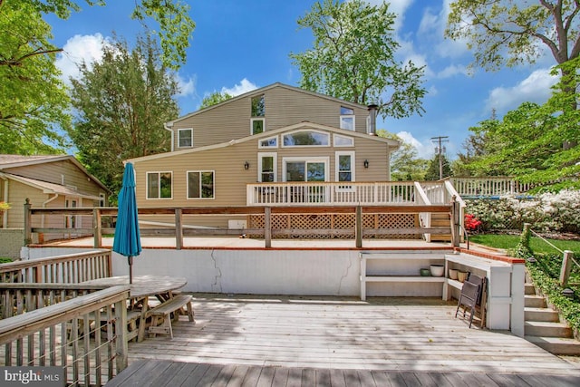 611 Cypress Rd, Severna Park, MD 21146 - rear view of property featuring outdoor dining area and a wooden deck