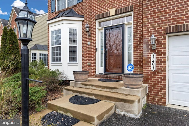 1201 Preserve Ln, Fredericksburg, VA 22401 - view of exterior entry featuring a garage and brick siding