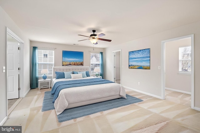 1201 Preserve Ln, Fredericksburg, VA 22401 - bedroom with ceiling fan, light colored carpet, and baseboards