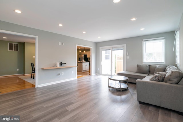 4600 Forge Acre Dr, Perry Hall, MD 21128 - living area with recessed lighting, baseboards, visible vents, and wood finished floors