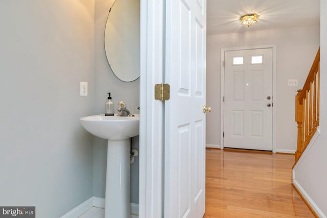 4600 Forge Acre Dr, Perry Hall, MD 21128 - entryway with stairway, baseboards, and light wood-type flooring