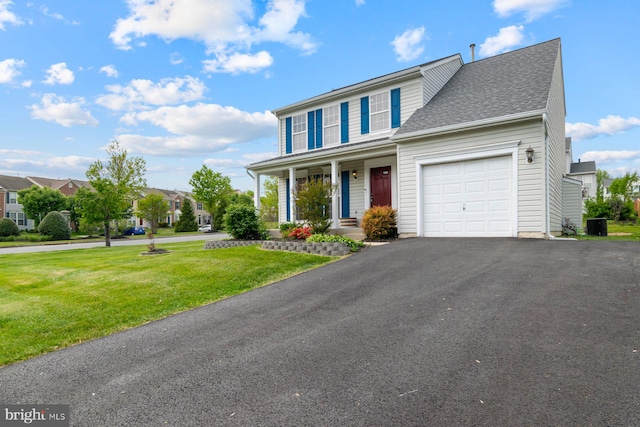 4600 Forge Acre Dr, Perry Hall, MD 21128 - view of front of home with a porch, roof with shingles, aphalt driveway, an attached garage, and a front lawn