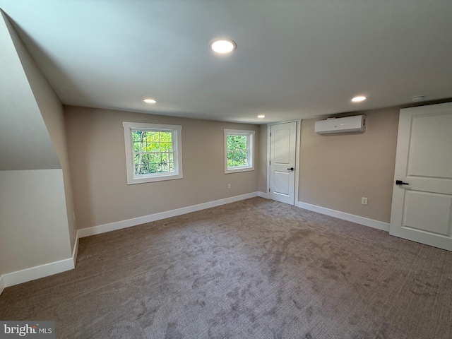 159 Rudloff Ln, Mohnton, PA 19540 - unfurnished bedroom featuring an AC wall unit, recessed lighting, carpet flooring, and baseboards
