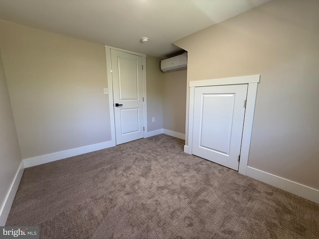159 Rudloff Ln, Mohnton, PA 19540 - unfurnished bedroom featuring an AC wall unit, carpet, and baseboards