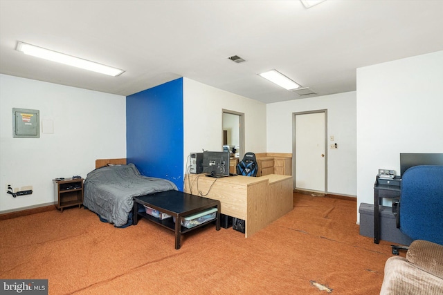 bedroom with visible vents and carpet