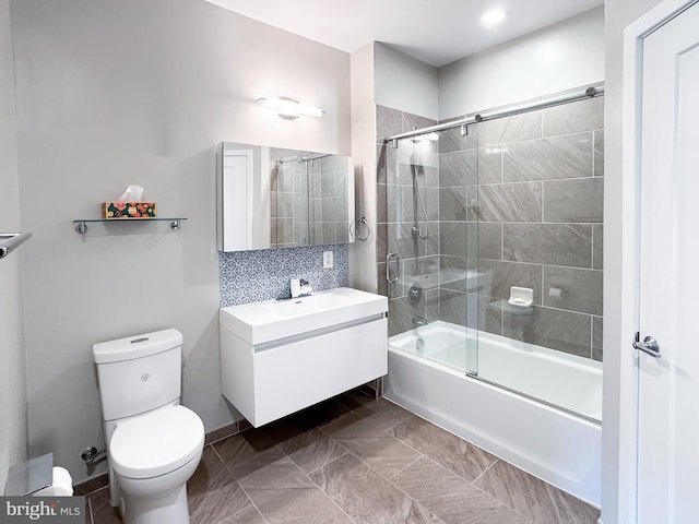 989 S Buchanan St Unit 221, Arlington, VA 22204 - bathroom featuring toilet, shower / bath combination with glass door, and vanity