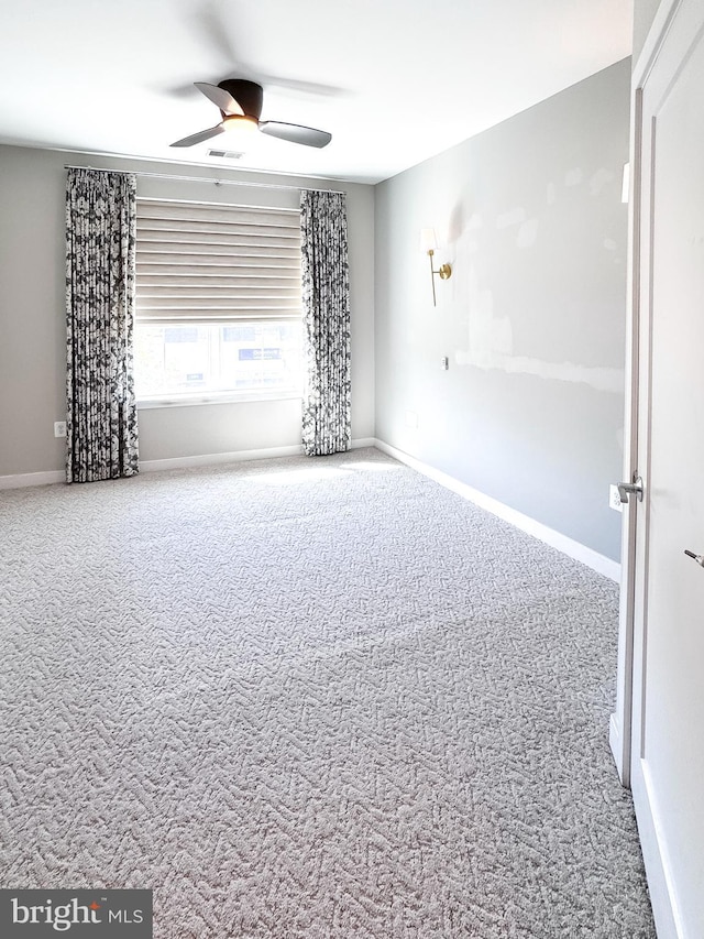 989 S Buchanan St Unit 221, Arlington, VA 22204 - carpeted empty room featuring a ceiling fan and baseboards