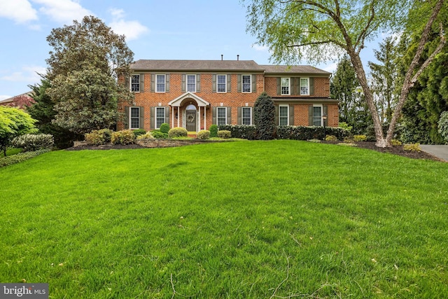 9 Selsed Garth, Lutherville Timonium, MD 21093 - view of front facade with brick siding and a front lawn