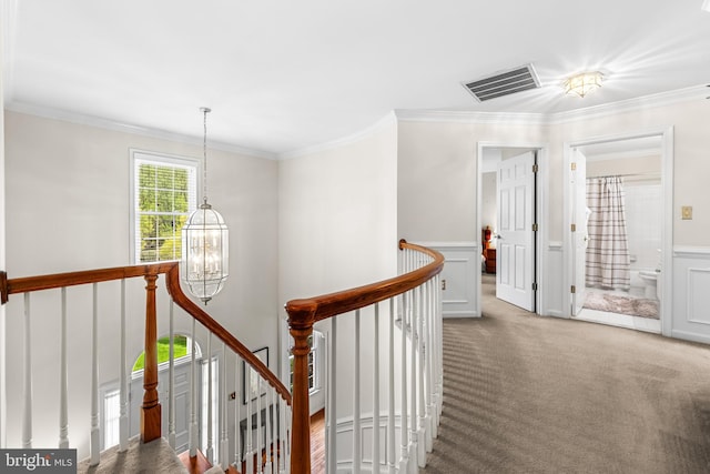 9 Selsed Garth, Lutherville Timonium, MD 21093 - hallway with carpet flooring, a chandelier, an upstairs landing, visible vents, and ornamental molding