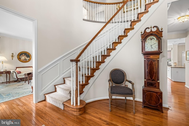 9 Selsed Garth, Lutherville Timonium, MD 21093 - stairs featuring crown molding and hardwood / wood-style floors