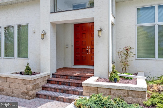 23 Deerfield Rd, Lancaster, PA 17603 - view of exterior entry featuring stucco siding