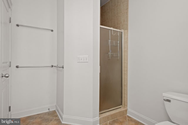 23 Deerfield Rd, Lancaster, PA 17603 - full bathroom with toilet, tile patterned flooring, a shower stall, and baseboards
