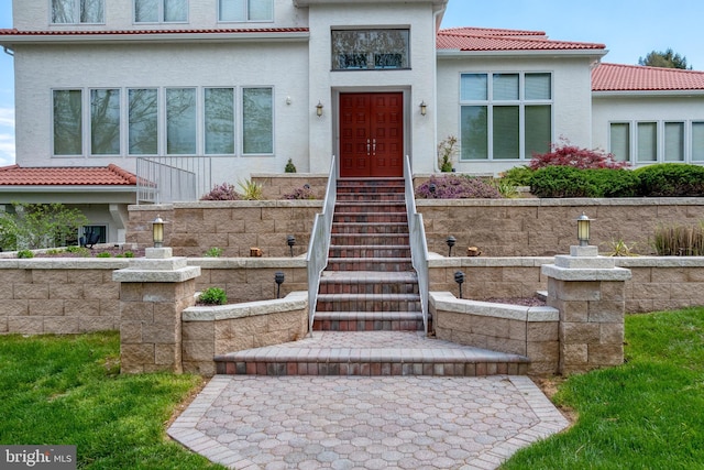 23 Deerfield Rd, Lancaster, PA 17603 - view of front of property featuring stucco siding and a tile roof