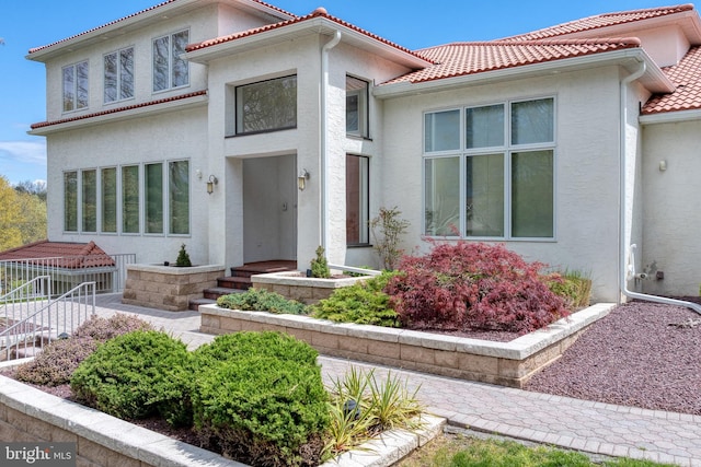 23 Deerfield Rd, Lancaster, PA 17603 - mediterranean / spanish-style home featuring stucco siding and a tiled roof