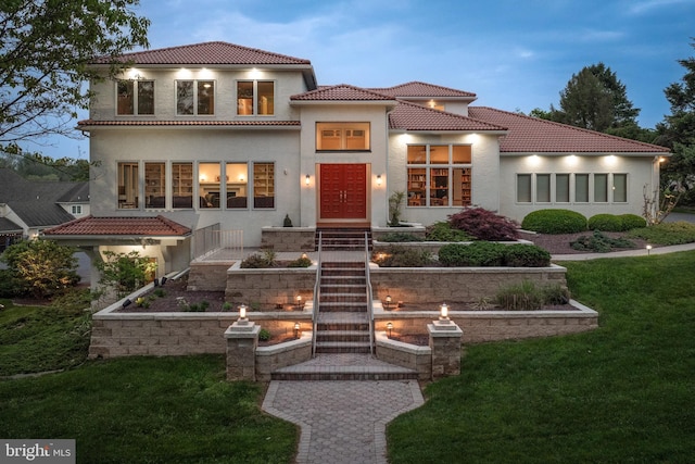 23 Deerfield Rd, Lancaster, PA 17603 - mediterranean / spanish house with stucco siding, a front yard, and a tiled roof