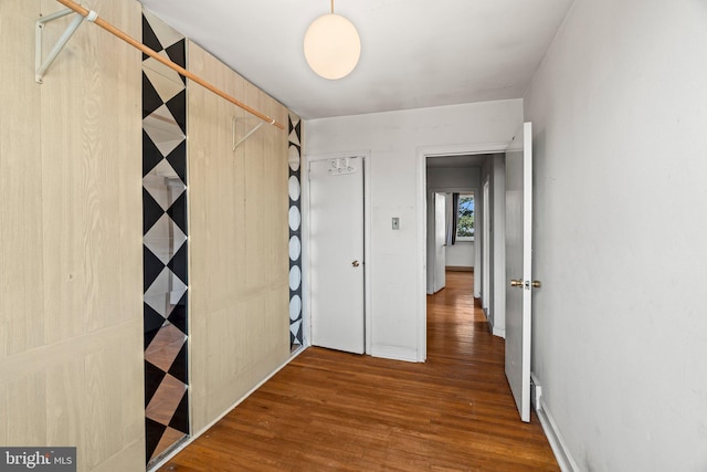 hallway with wood finished floors