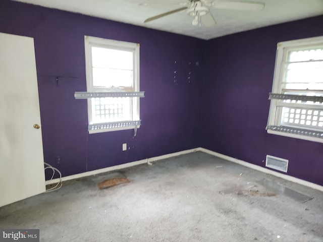 130 5th Ave, Baltimore, MD 21227 - carpeted empty room featuring plenty of natural light, ceiling fan, and baseboards