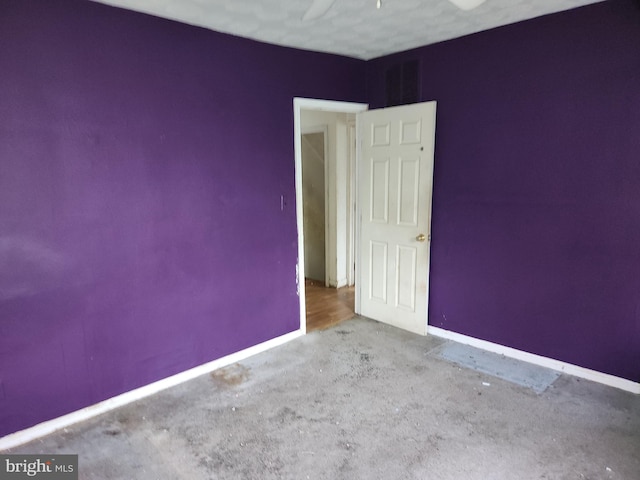 130 5th Ave, Baltimore, MD 21227 - spare room featuring carpet floors, baseboards, and ceiling fan